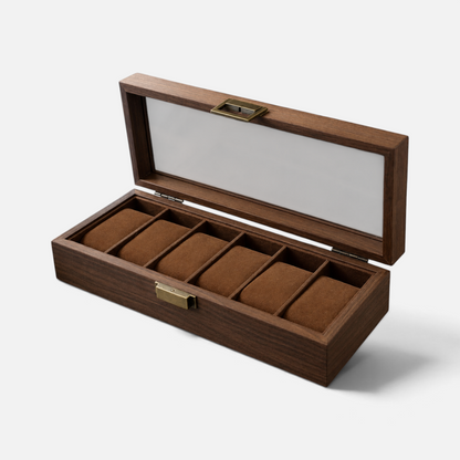 Clairly Thornbury 6-slot watch box in dark walnut wood with a glass lid and brass-toned hardware on a wooden dresser.