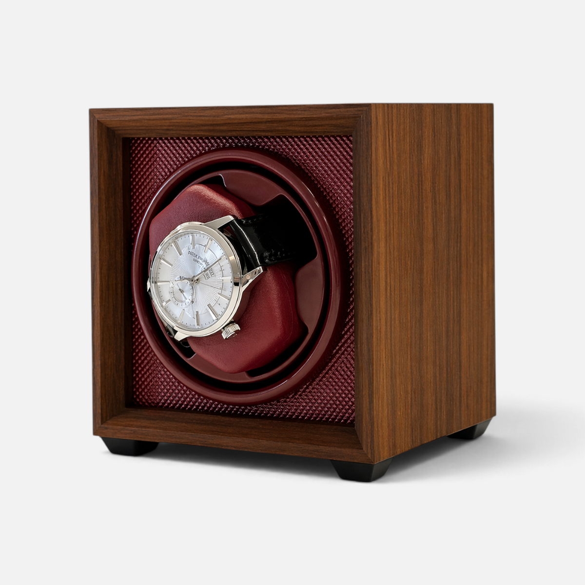 Clairly Heritage 1-slot automatic watch winder in solid wood with a deep red interior and a luxury wristwatch inside.