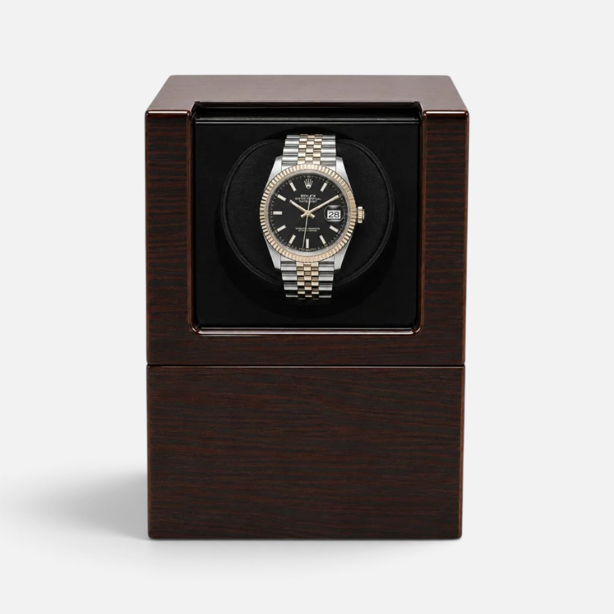 Clairly Marlow single slot watch winder in dark wood with a glass display housing a two-tone automatic wristwatch.