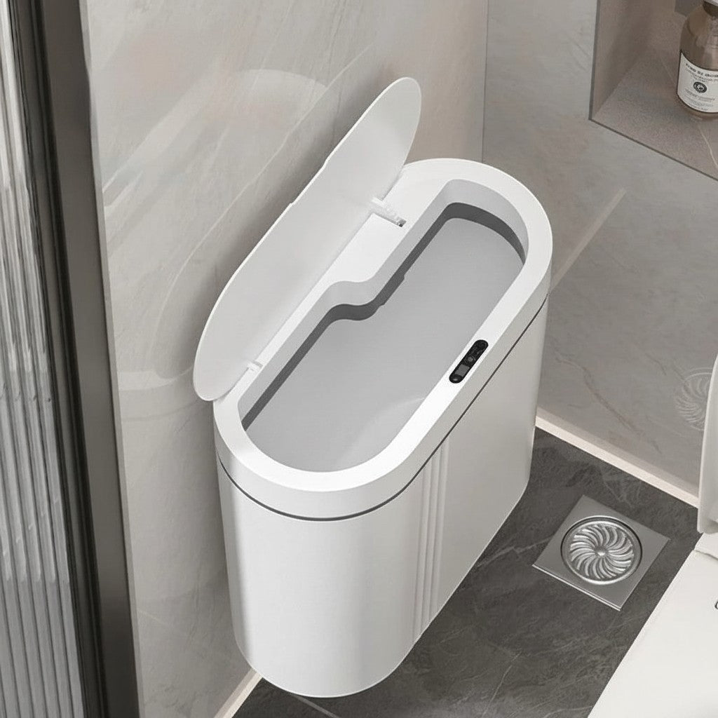 Clairly white wall-mounted sensor trash can with an open lid in a modern bathroom setting