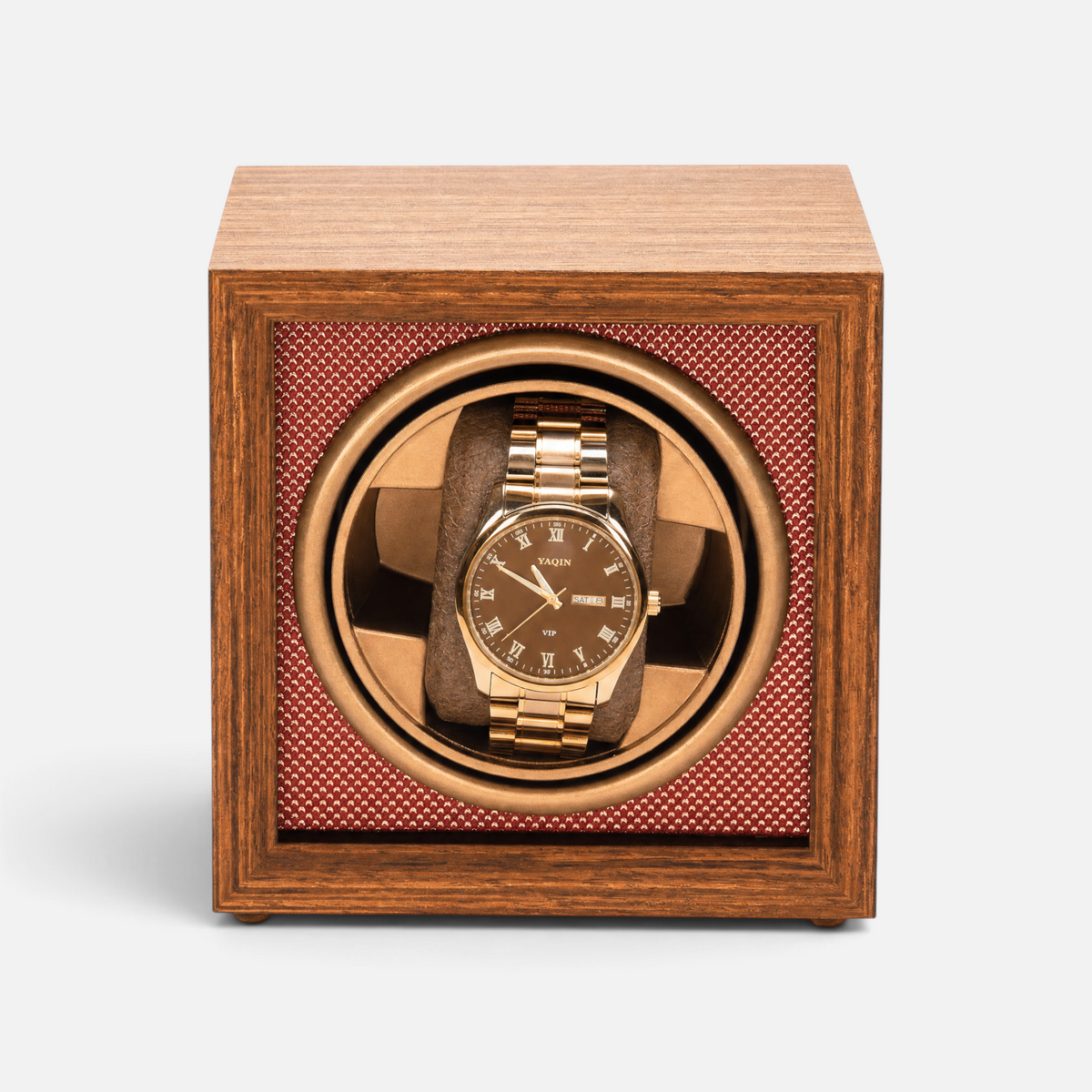Clairly Heritage 1-slot watch winder in solid wood with a gold watch inside, featuring a glass lid and quiet motor.
