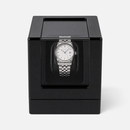 Clairly Onyx 1-slot watch winder in a glossy black finish holding a silver automatic watch with a white dial