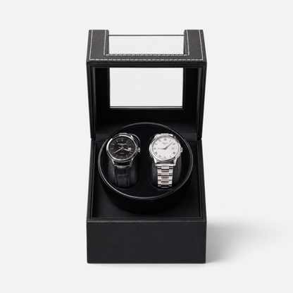 Clairly Portman 2-slot watch winder with black leather finish, magnetic glass lid, and two automatic watches inside.