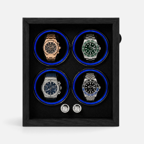 Clairly Midnight 4-slot automatic watch winder in black wood with blue ambient lighting and smoked glass front